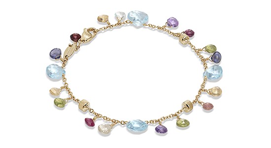 a yellow gold chain bracelet featuring a number of different gemstones