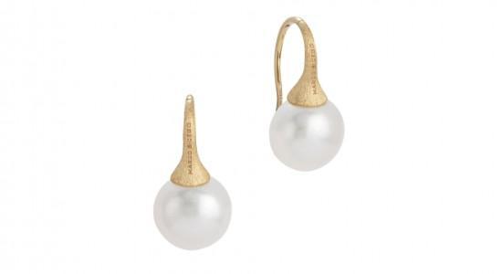 A pair of Marco Bicego pearl drop earrings with a yellow gold setting, available at Aucoin Hart Jewelers.