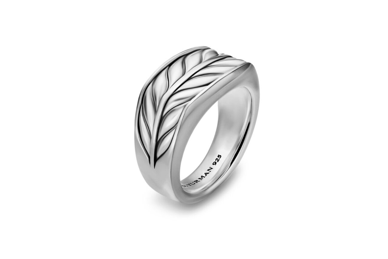 A silver ring with leaf-like detailing.