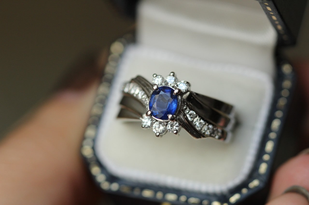 a sapphire and diamond fashion ring in a luxurious ring box