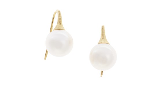 a pair of pearl earrings with a modern setting by Marco Bicego.