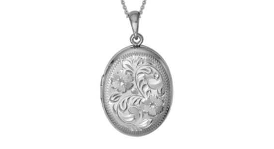 a sterling silver locket necklace with engraved flowers