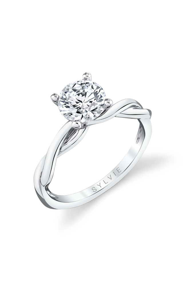 Sylvie’s beautiful round cut spiral engagement ring.