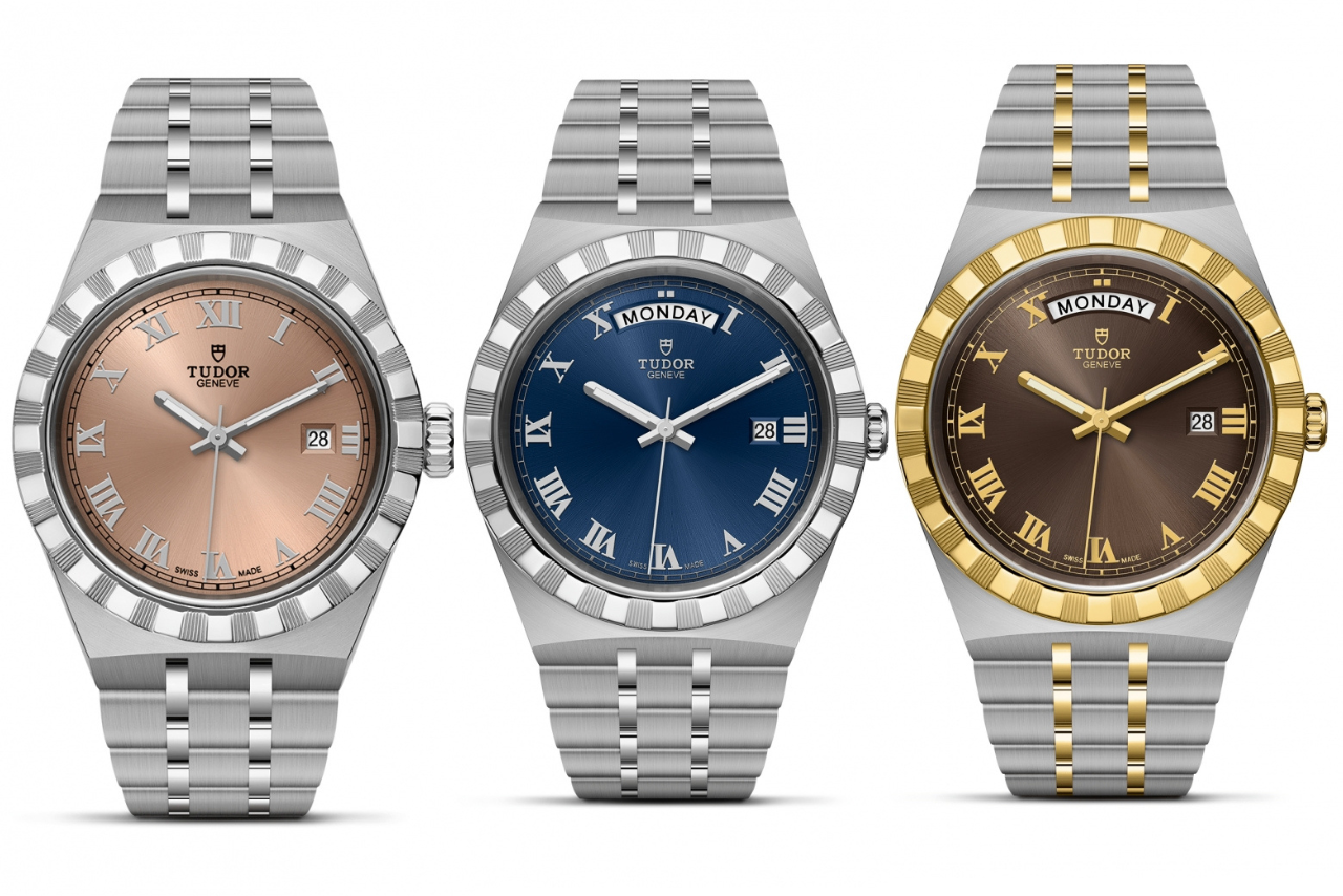 Three TUDOR watches with metallic bracelets, as well as rose gold, deep blue, and chocolate gold dials with roman numerals.