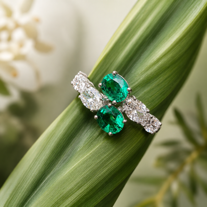 18K White Gold Oval Emerald and Diamond Bypass Ring.